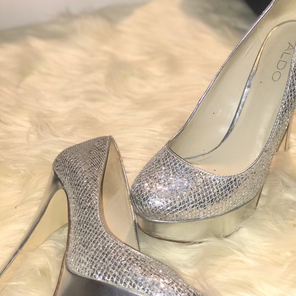 Pizzazz, sparkly heel slightly worn